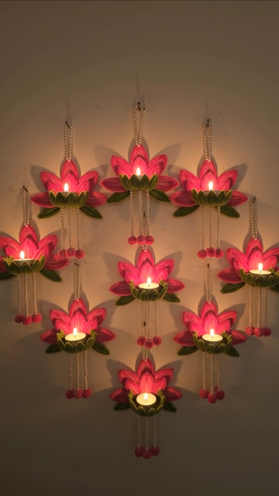 Pink Lotus Tealight Holder — Handmade pink lotus tealight holder with pearl-style hanging strands and floral accents.